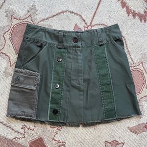 Burning Torch one-of-a-kind upcycled army mini skirt with pockets. Size 2